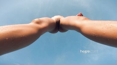 Sexy babe naked on beach