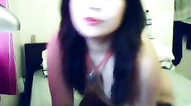 Asian brunette MILF masturbating on webcam