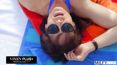 A stunning curvy MILF shows off her riding skills in the sun during an intense poolside session