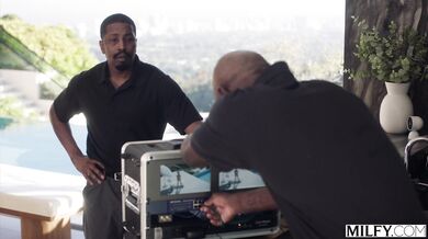 Melissa Stratton handles two giant black members at once during a high energy session