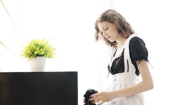 Horny maid Lisa Bon fingering her wet pussy in hotel room solo