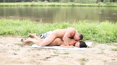 Sexy brunette Viktoria Sweet gives a deep blowjob outdoors in nature