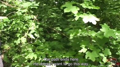 Busty blonde Bambi Bella giving a deep blowjob in a risky public place